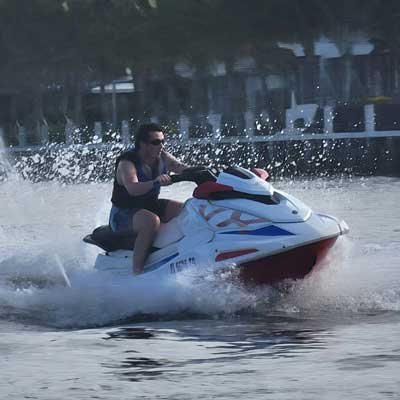 A man driving a jet ski