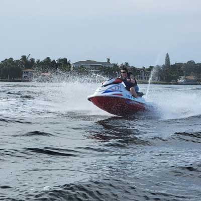 A man driving a jet ski