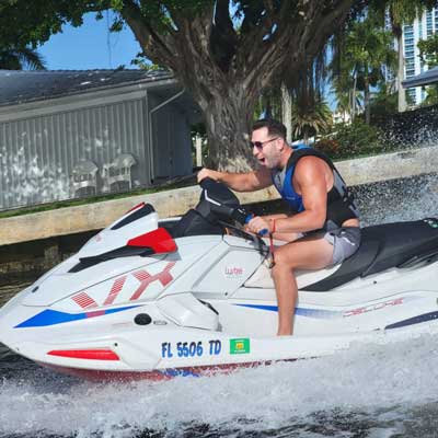 A man driving a jet ski