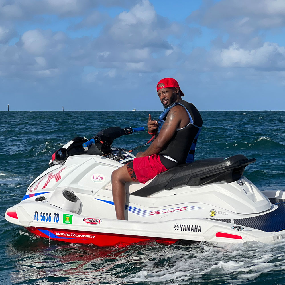 A man sitting on a jet ski